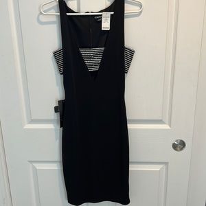 Brand new, XS, Bebe, cut out midi dress with stones. Black.